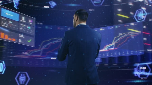 Control room2 Virtual Reality Concept: Businessman Uses Smartphone in 3D World Surrounded by e-Business, e-Commerce, Stock Market, Infographics, Finance, Analysis, Charts, Graphs Icons. 360 Degree Tracking Arc Shot